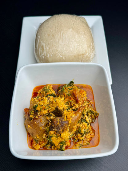 Egusi soup served with pounded yam